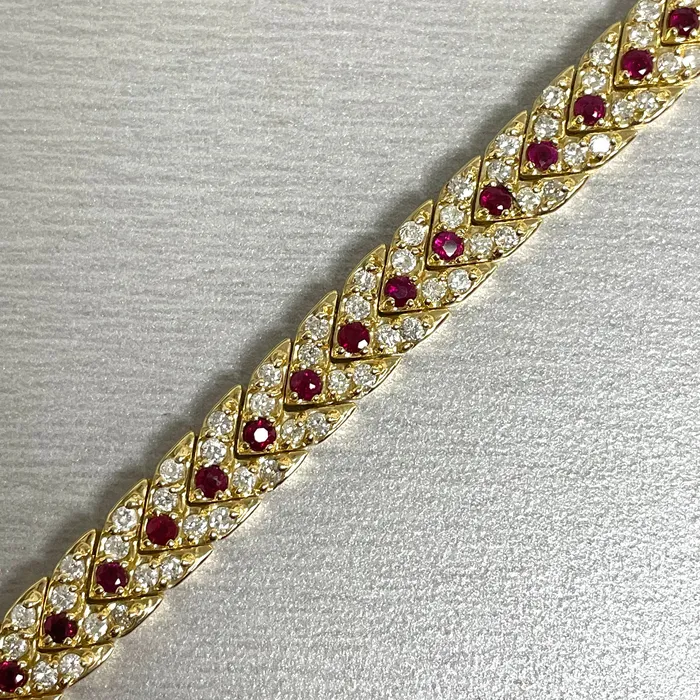 Beauvince Bracelets Beauvince Directions Bracelet 438 ct Diamonds Rubies in Yellow Gold