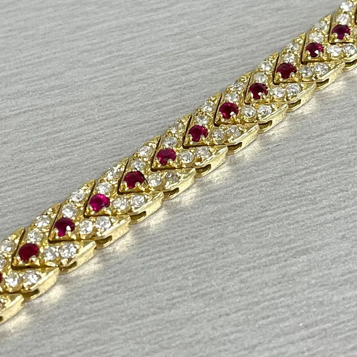 Beauvince Bracelets Beauvince Directions Bracelet 438 ct Diamonds Rubies in Yellow Gold